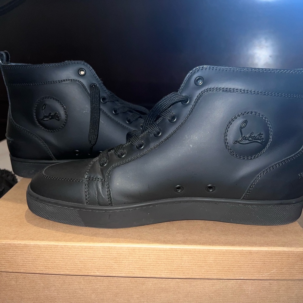 Authentic Christian Louboutin Louis high top leather sneakers.